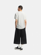 n. クロップドパンツ